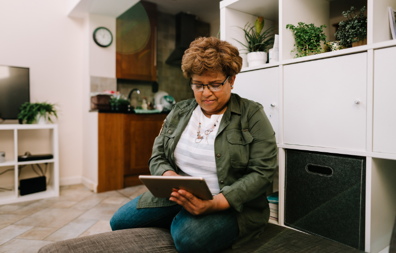 Lady using a tablet to book an appointment