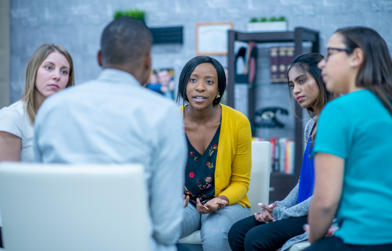 A group of people in conversation