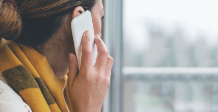 A lady making a telephone call