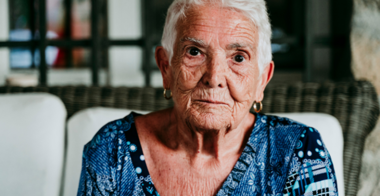 A head and shoulder picture of an elderly lady