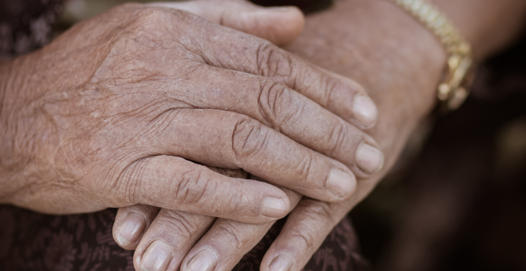A pair of hands clasped together