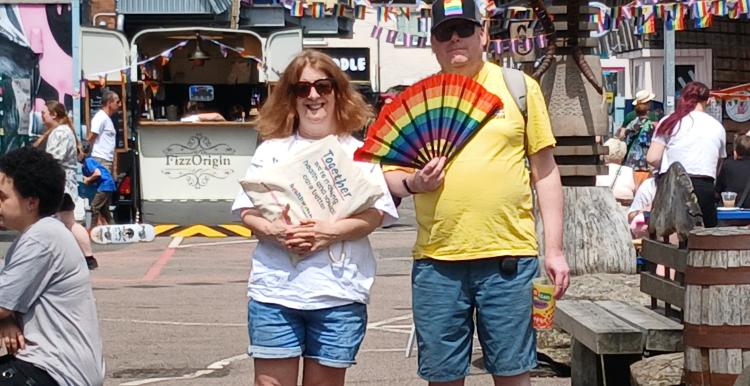 An image of Healthwatch member of staff and Volunteer attending Pride Event