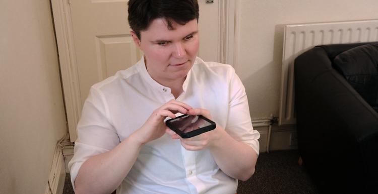 A person using a mobile phone