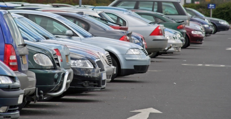 Picture of row of cars parked in car park