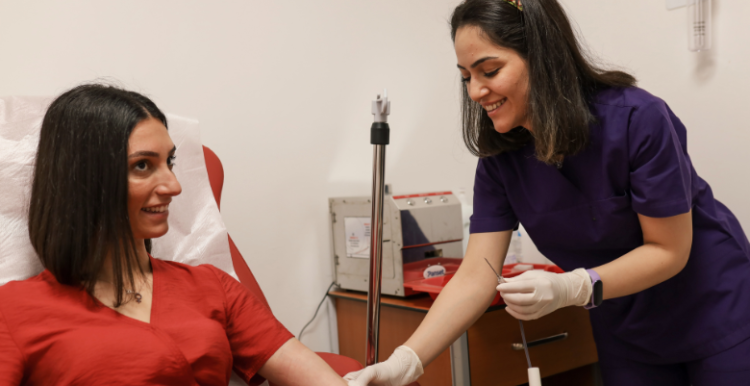 A woman donating blood