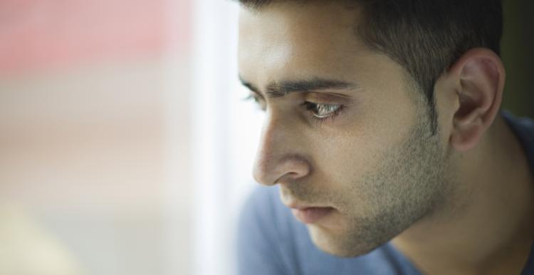 Image of man looking to the side Image of man looking to the side