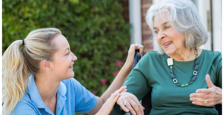 Lady and carer elderly_lady_and_carer_outside