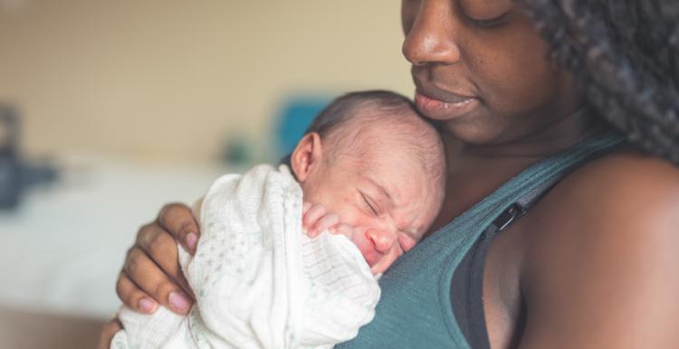 Picture of a mother holding a baby