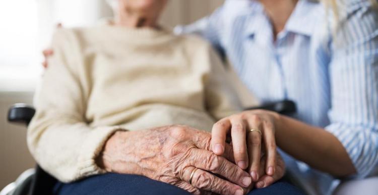 Older woman in wheelchair Older woman in wheelchair