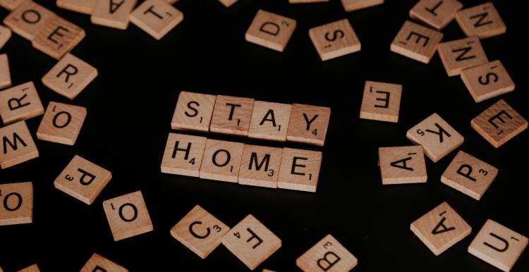 Scrabble pieces spelling out Stay home