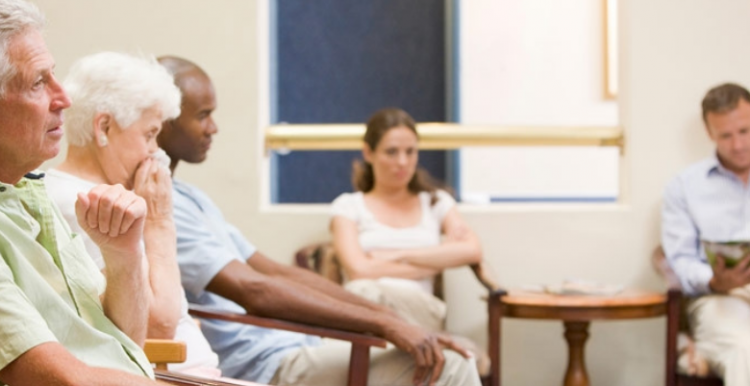 People sat in waiting room Five_people_sat_in_waiting_room