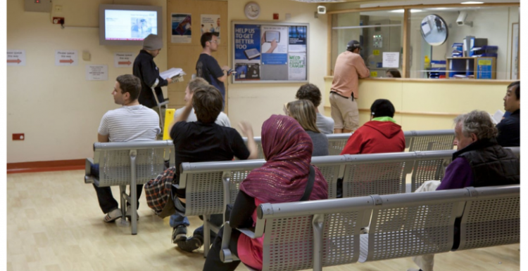 people_sat_in_hospital_waiting_room