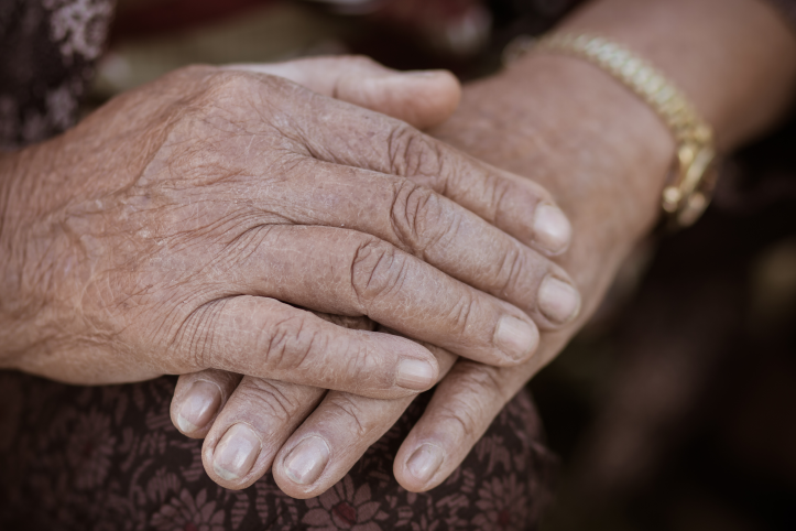 A pair of hands clasped together