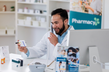 Pharmacist talking to a patient on the telephone
