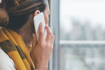 A lady making a telephone call