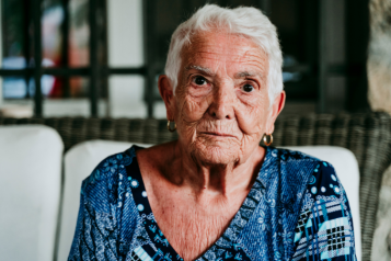 A head and shoulder picture of an elderly lady