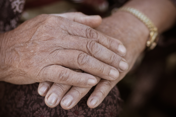 A pair of hands clasped together