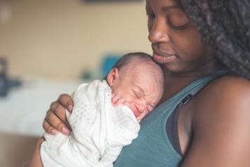 Picture of a mother holding a baby