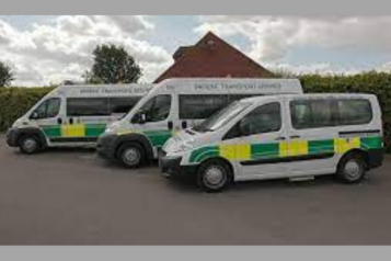 Picture of 3 patient transport ambulance vehicles