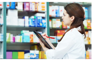 pharmacist_standing_in_front_of_medication