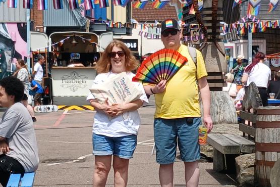 An image of Healthwatch member of staff and Volunteer attending Pride Event