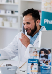 Pharmacist talking to a patient on the telephone